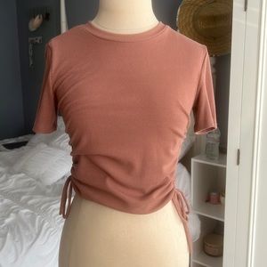 Muted pink crop top with tie up sides